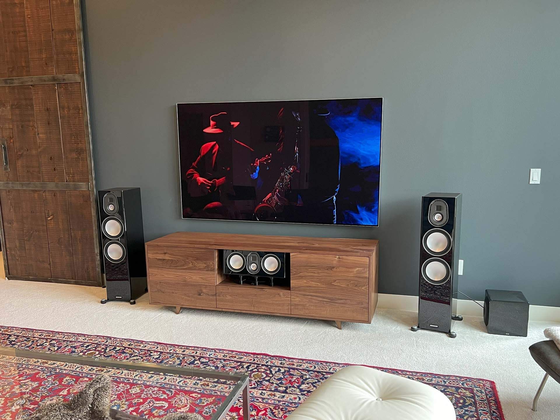 Big Screen surrounded by high end speakers